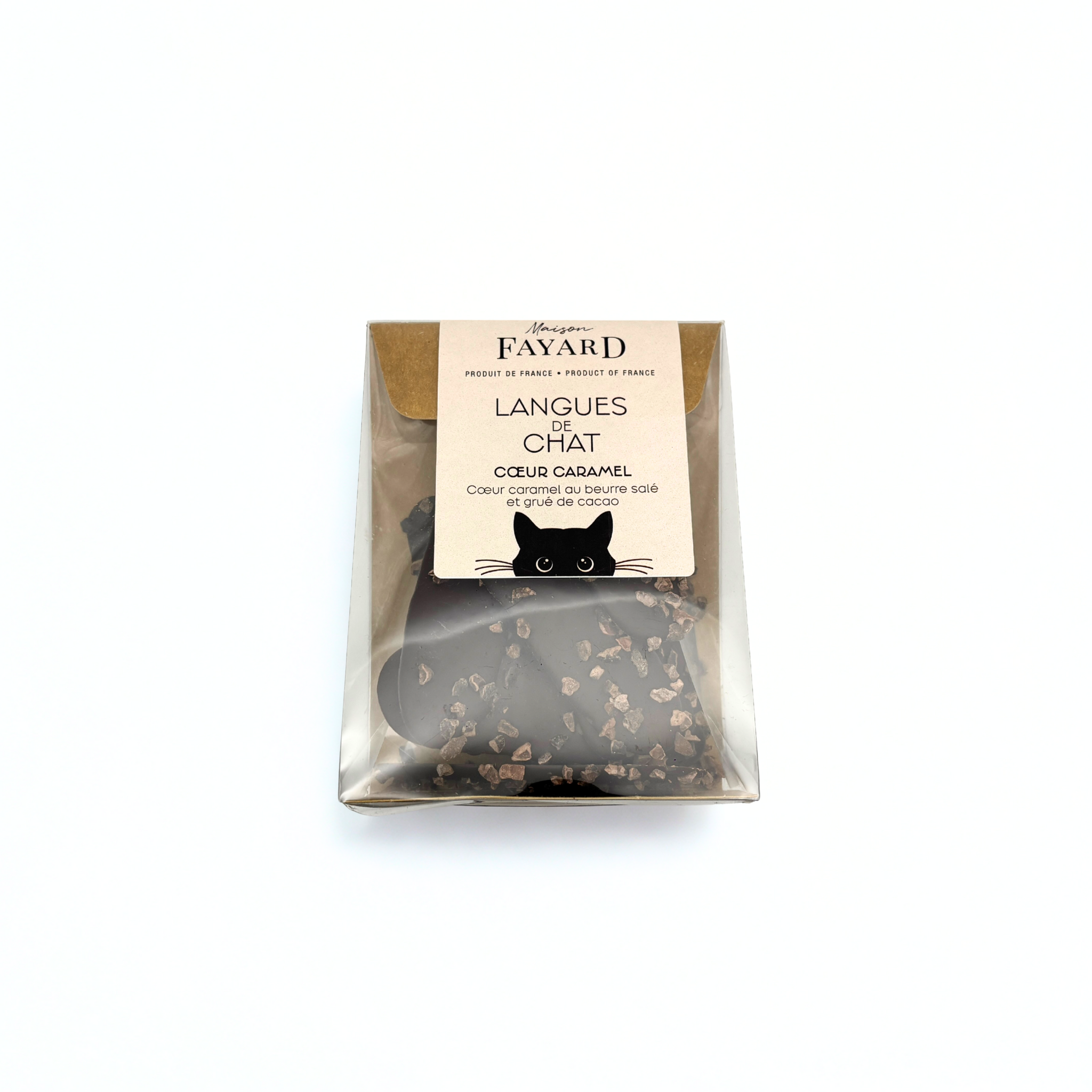 De fines langues de chat au chocolat noir, délicatement saupoudrées de grué de cacao. Une bouchée élégante, fine et croquante, où l’intensité du cacao est mise en valeur sans excès de sucre.